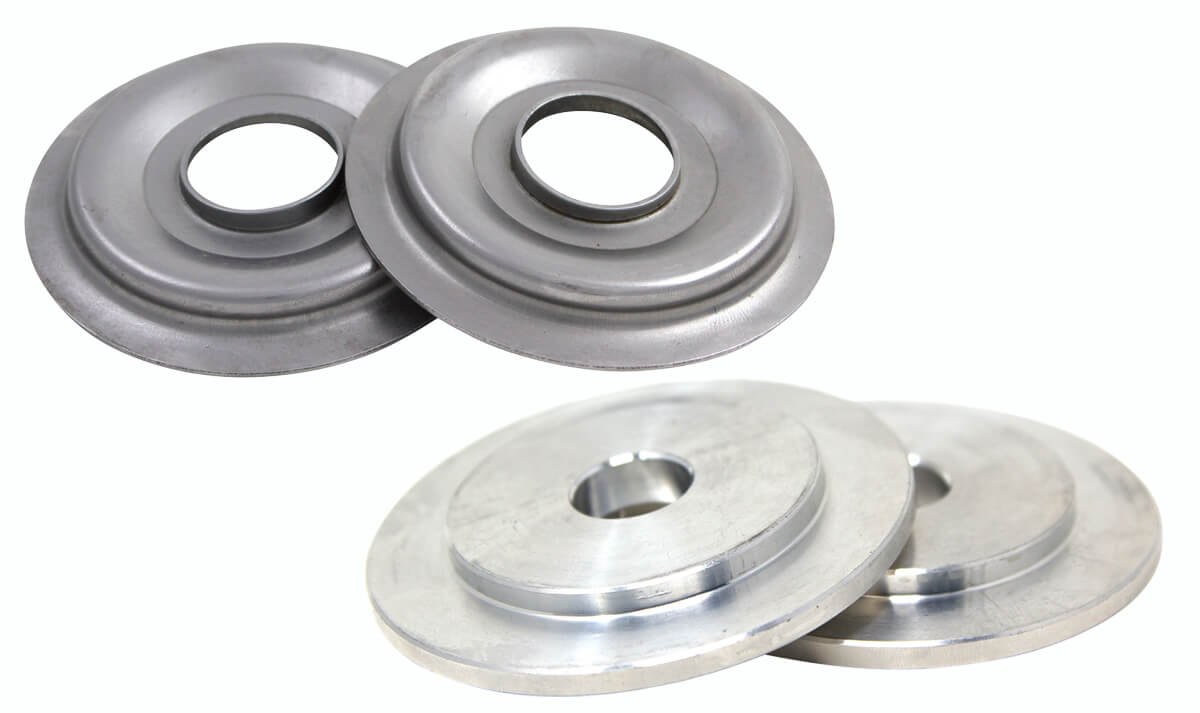Two pairs of metal wheel brush adapters on a white background